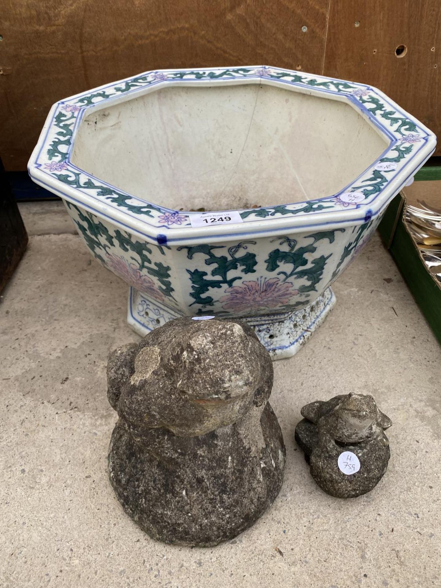 A DECORATIVE OCTAGONAL CERAMIC PLANTER AND TWO RECONSTITUTED STONE FROG GARDEN ORNAMENTS
