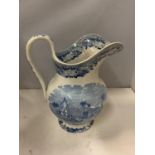 A VINTAGE BLUE AND WHITE JUG WITH TRANSFER PRINT