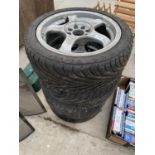 A SET OF FOUR RIMS WITH 195/45R15 TYRES