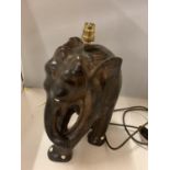 A HARDWOOD CARVED ELEPHANT TABLE LAMP WITH BONE DETAILING, ONE TUSK MISSING, HEIGHT 37CM