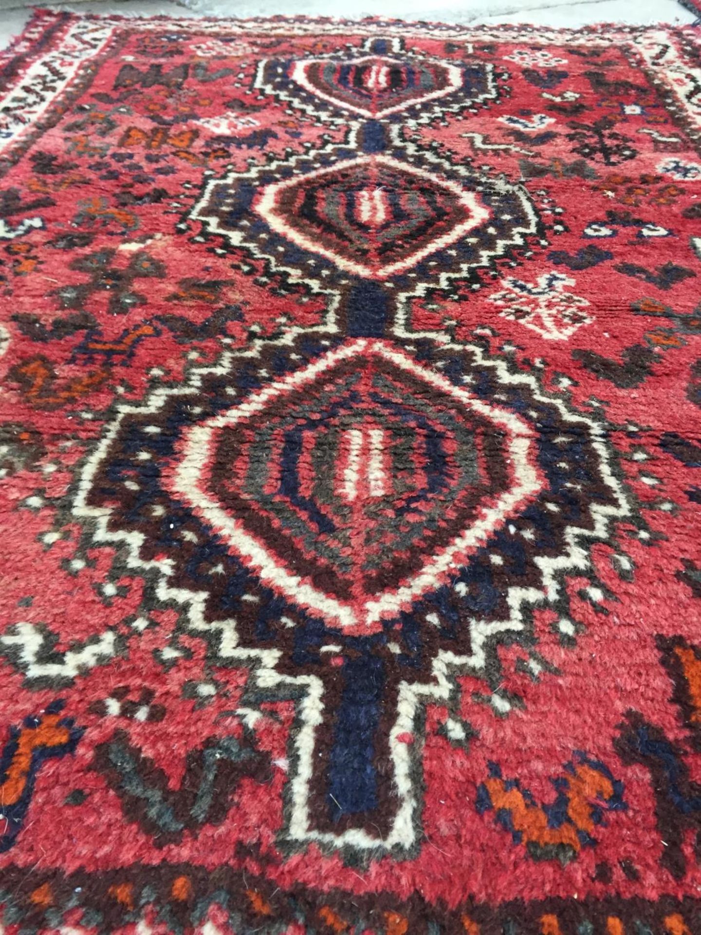 A RED GROUND RUG, 58" X 40" - Image 3 of 3