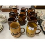 ELEVEN SYLVAC TANKARDS DEPICTING MAINLY ANIMAL AND WATER MILL COTTAGE SCENES
