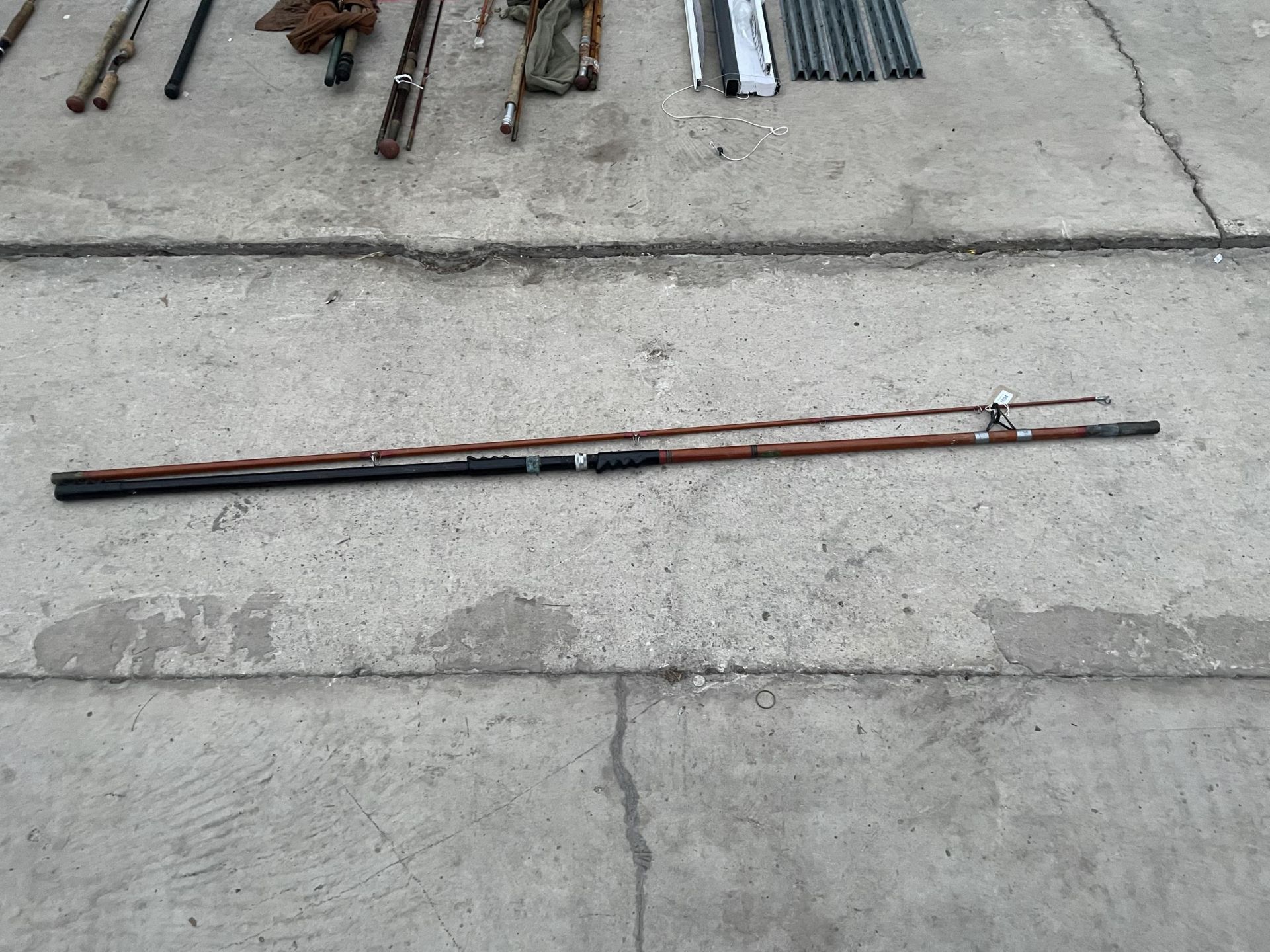 A TWO PIECE AUGER BEACH CASTER ROD - 12'