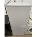 A WHITE UPRIGHT FRIDGE FREEZER