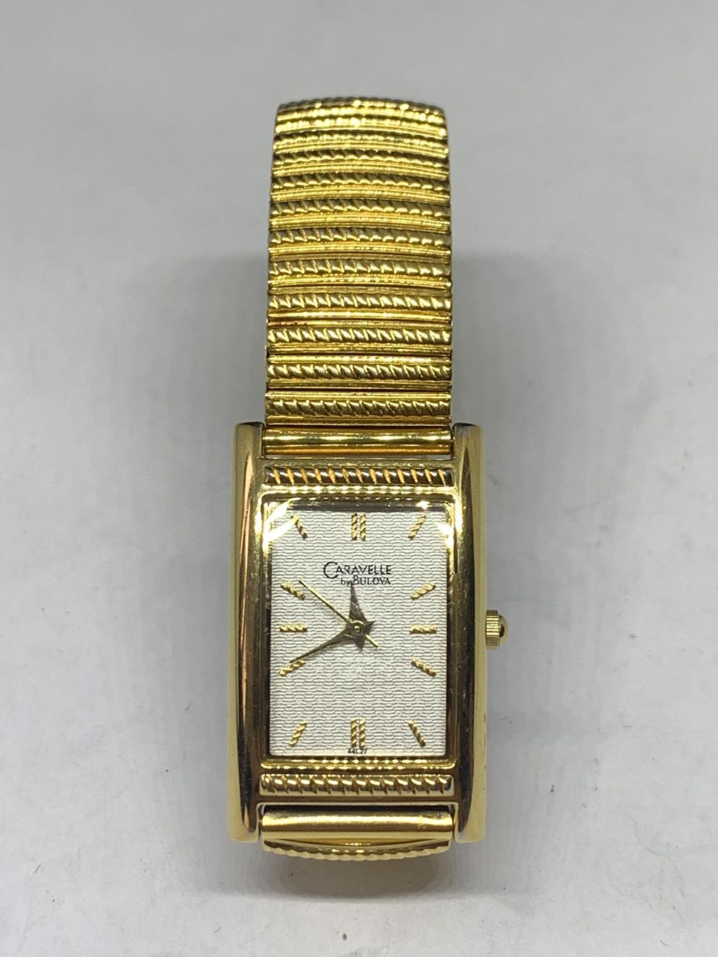 A GOLD PLATED CARAVELLE WRIST WATCH SEEN WORKING BUT NO WARRANTY