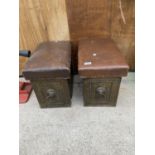 A PAIR OF VINTAGE BRASS COVERED AND LEATHER TOPPED CLUB FENDER BOXES WITH LION HEAD DECORATION