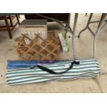 AN ASSORTMENT OF ITEMS TO INCLUDE A WINDBREAK, A WINE RACK AND A LAUNDRY BASKET ETC
