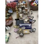 AN ASSORTMENT OF METAL WARE ITEMS TO INCLUDE COW BELLS, A BRASS BOAT AND FLATWARE ETC