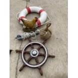 AN ASSORTMENT OF ITEMS TO INCLUDE A SHIPS WHEEL, A BOYANCE AID AND A FOLDING ANCHOR ETC