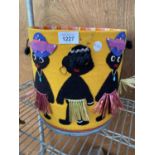 A VINTAGE WASTE PAPER BIN WITH TRIBAL DECORATION