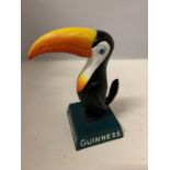 A CAST GUINNESS TOUCAN FIGURE