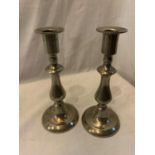 A PAIR OF MARKED PEWTER CANDLESTICKS HEIGHT 20CM