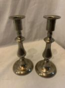 A PAIR OF MARKED PEWTER CANDLESTICKS HEIGHT 20CM