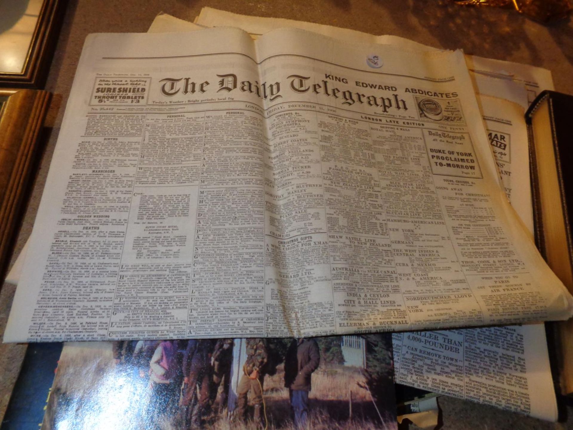 A COLLCECTION OF COPIES OF THE DAILY TELEGRAPH TO INCLUDE 1936, 1945 ETC AND A PHOTOGRAPH ALBUM - Image 2 of 3