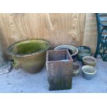 A LARGE ASSORTMENT OF PLANTERS AND PLANT POTS TO INCLUDE A LARGE TERRACOTTA POT