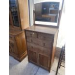 AN EARLY 20TH CENTURY OAK TALLBOY WITH SWING FRAME MIRROR, 27" WIDE