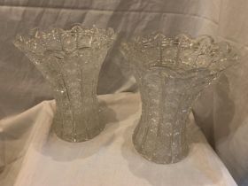 A PAIR OF HEAVY CUT GLASS VASES 27CM TALL