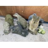 AN ASSORTMENT OF RECONSTITUTED STONE GARDEN FIGURES TO INCLUDE A BADGER, HEDGEHOG AND PIG ETC