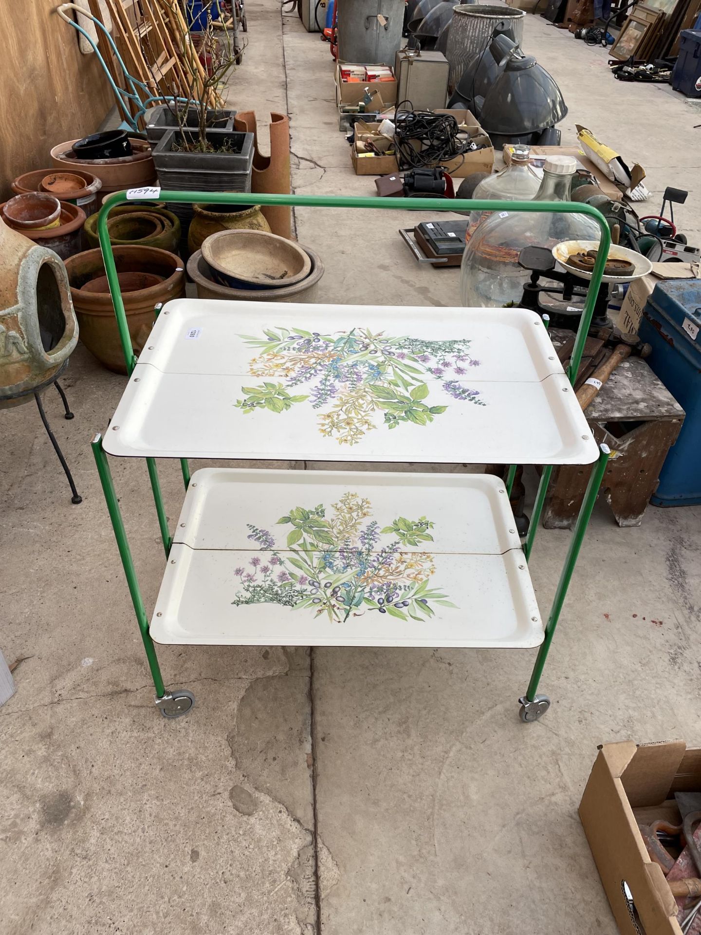 A METAL FOLDING TEA TROLLEY