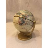 A CHILD'S TOY GLOBE HEIGHT 13CM