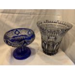 TWO LARGE BLUE AND CLEAR CUT GLASS ITEMS TO INCLUDE A VASE HEIGHT 26CM AND A BOWL ON A PEDESTAL