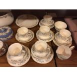 A PART CHINA TEASET IN THE 'GAINSBOROUGH' PATTERN WHICH INCLUDES, SIX TRIOS, CREAM JUG, SUGAR BOWL