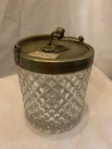 A BISCUIT BARREL BY PERCIVAL VICKERS MANCHESTER DIAMOND LOZENGE CUT GLASS AND A SILVER PLATED LID,