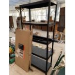 A FIVE TIER PLASTIC SHELVING UNIT AND A FLAT PACK WORK BENCH WITH BACK BOARD