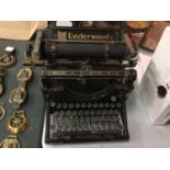 A VINTAGE UNDERWOOD TYPEWRITER STAMPED 'MADE IN THE USA'