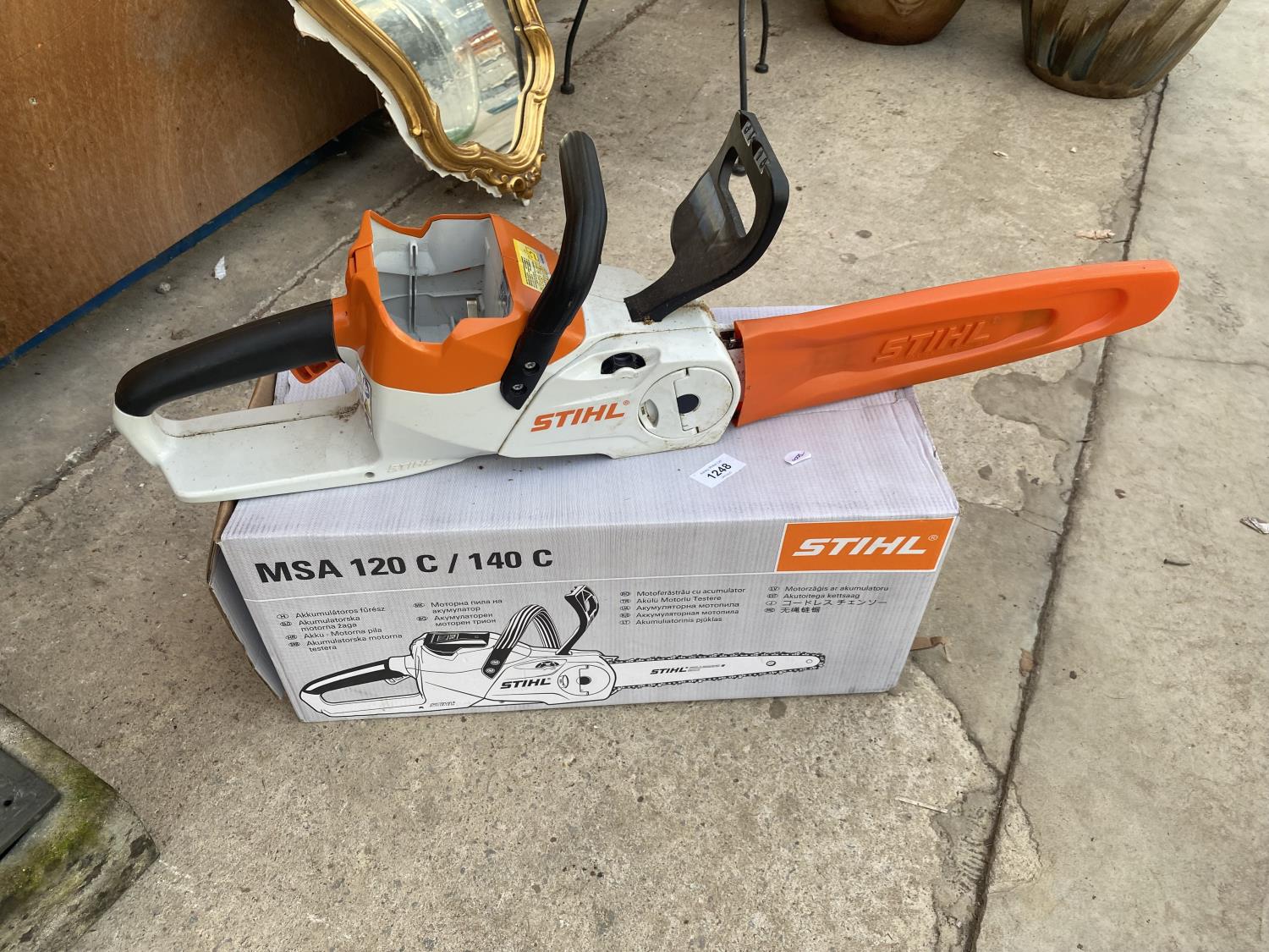 A STHIL MSA 120C BATTERY POWERED CHAINSAW (NO BATTERY)