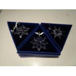 THREE SWAROVSKI ANNUAL EDITION SNOWFLAKE CHRISTMAS ORNAMENTS 2009, 2012, 2013 IN BOXES