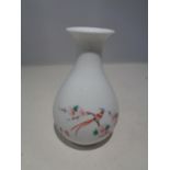 AN ORIENTAL HAND PAINTED VASE SIGNED TO THE BASE