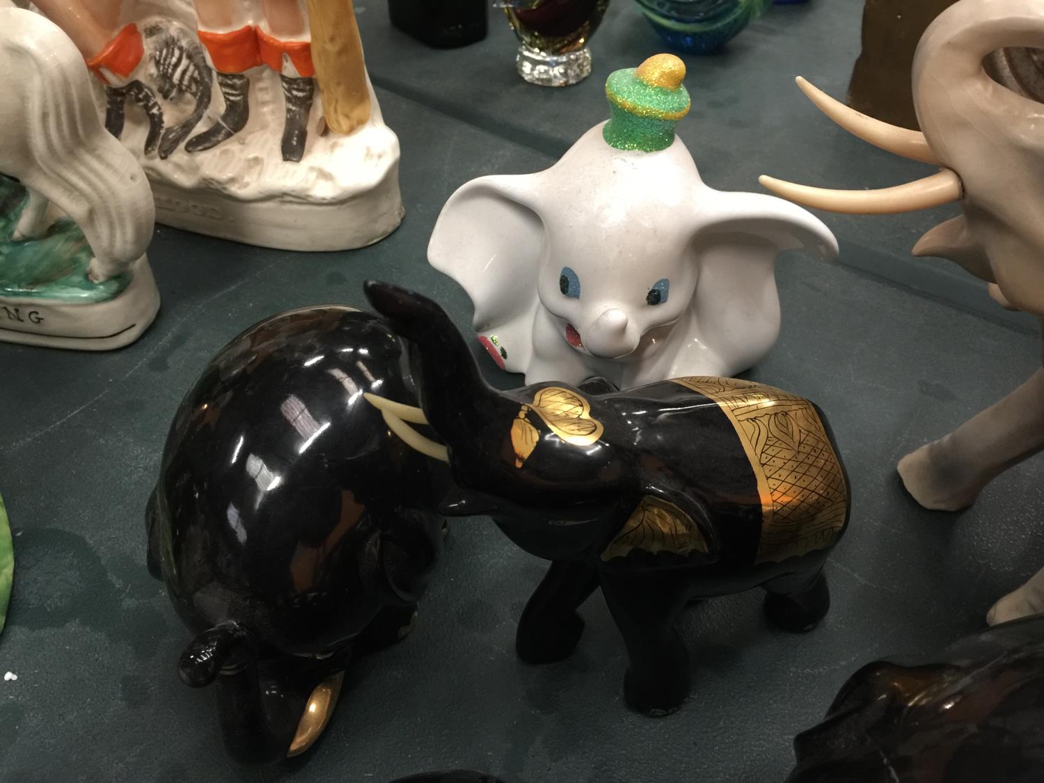 A QUANTITY OF ELEPHANTS TO INCLUDE DUMBO, BLACK AND GOLD, FLORAL DECORATED, ETC - Image 4 of 5