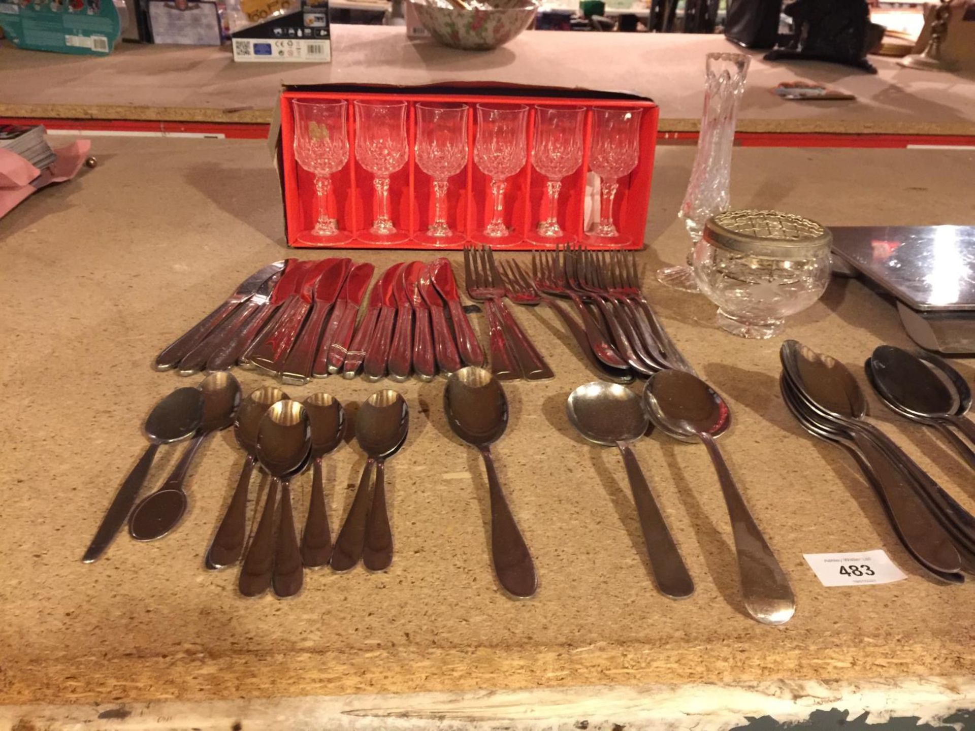 A QUANTITY OF FLATWARE AND A BOX SET OF CRYSTAL D'ARQUES GLASSES, SCALES. ETC