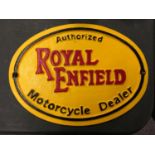 A ROYAL ENFIELD MOTORCYCLE DEALER CAST SIGN