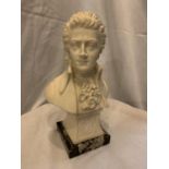 A BUST OF MOZART ON A MARBLE BASE SIGNED FARO