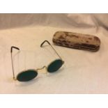 A PAIR OF JOHN LENNON STYLE GLASSES IN A CASE