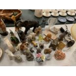 A QUANTITY OF COLLECTABLE ANIMAL FIGURES TO INCLUDE, ELEPHANTS, DOGS, BIRDS, ETC
