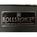 A ROLLS ROYCE LONDON AND MANCHESTER CAST SIGN