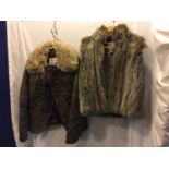 A LADIES LAKELAND COAT SIZE 14 AND A WAREHOUSE FAUX FUR GILET IN A SIZE 16