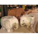 THREE ELEPHANT PLANTERS TI INCLUDE A PAIR OF CERAMIC AND A WICKER