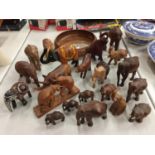 A LARGE QUANTITY OF MAINLY WOODEN ELEPHANTS