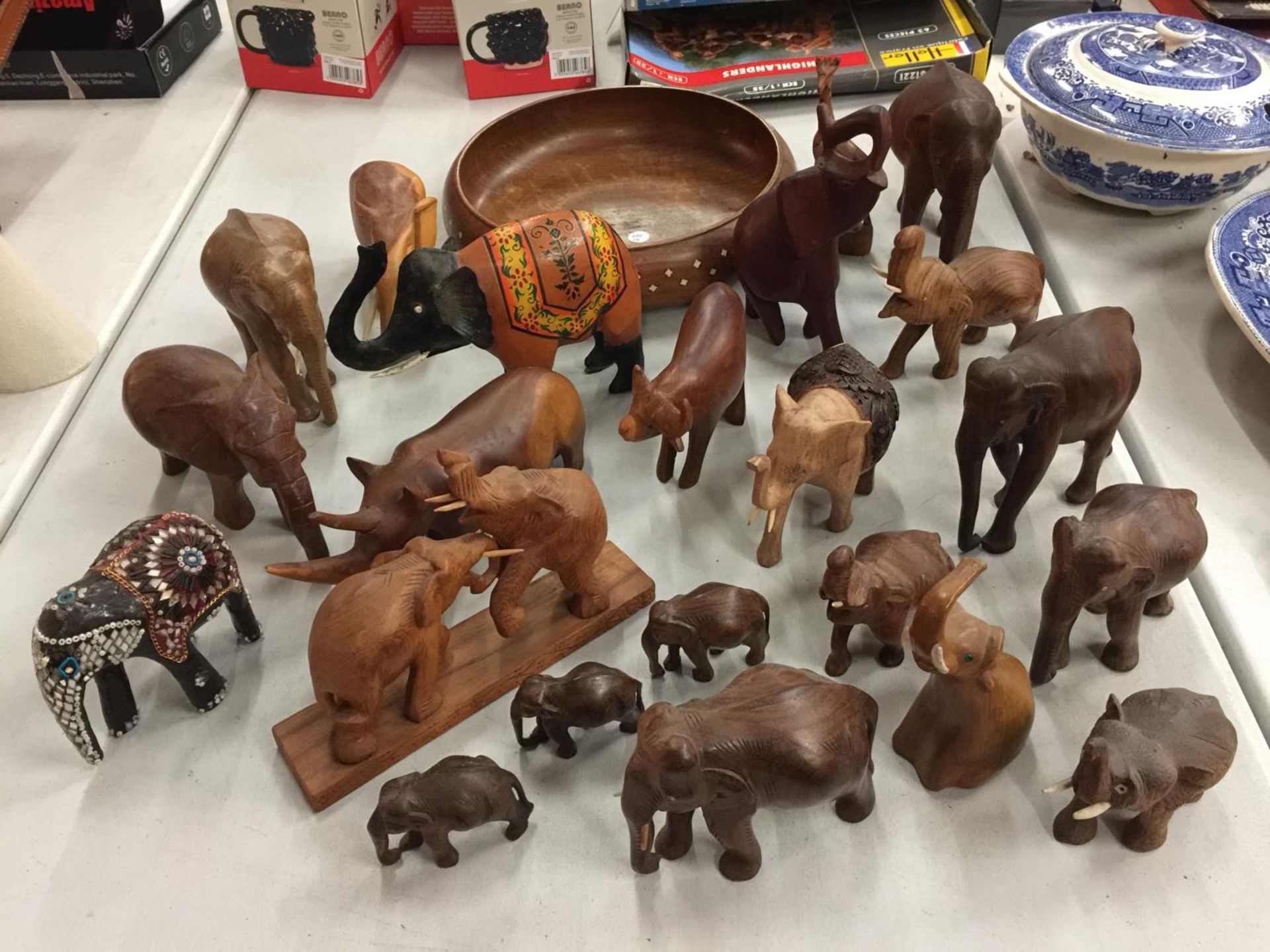 A LARGE QUANTITY OF MAINLY WOODEN ELEPHANTS