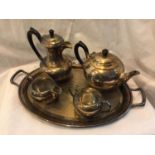 A METAL TEA SET COMPRISING OF A TEAPOT, COFFEE POT, CREAM JUG, SUGAR BOWL AND TRAY