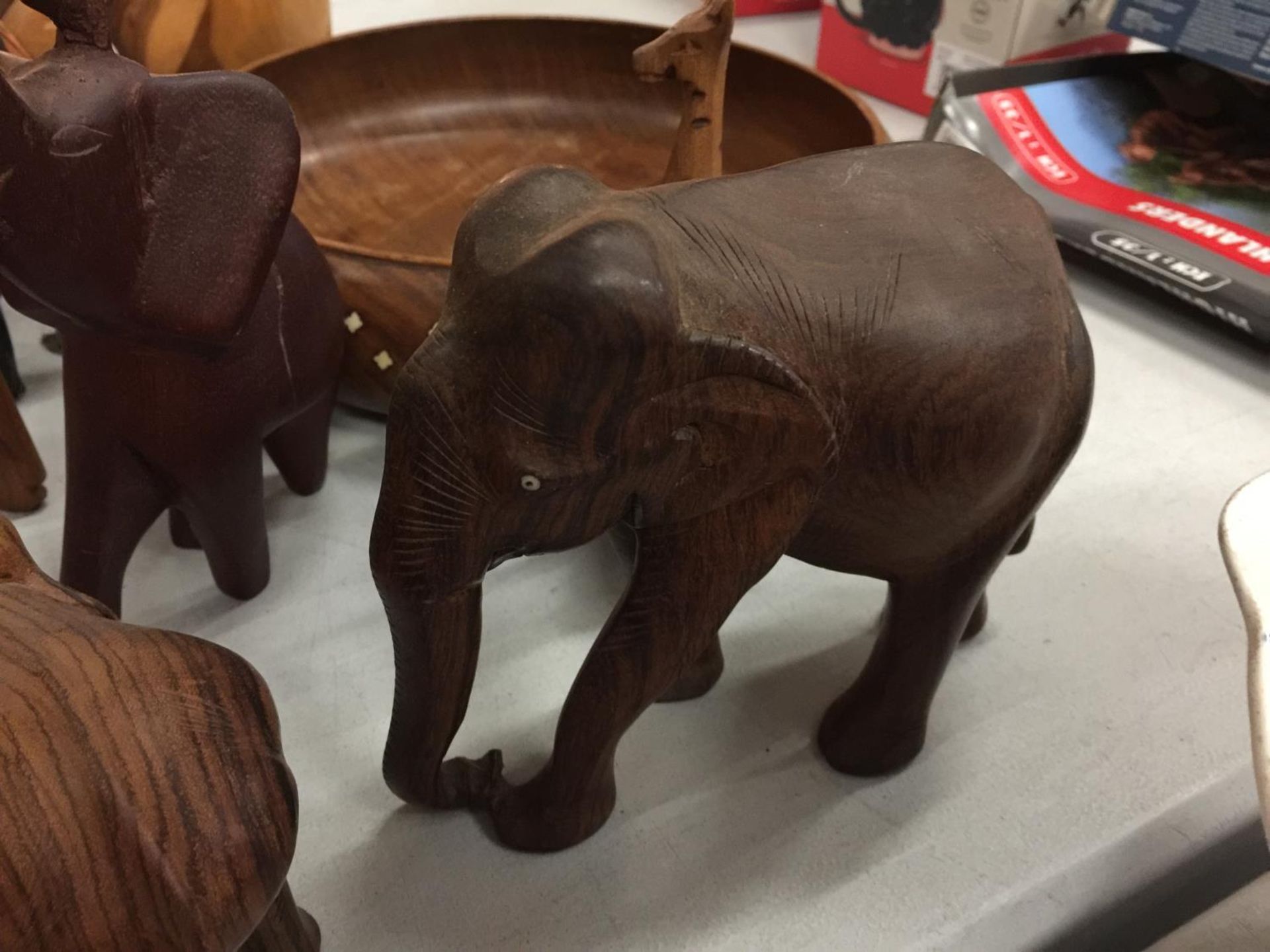 A LARGE QUANTITY OF MAINLY WOODEN ELEPHANTS - Image 7 of 10