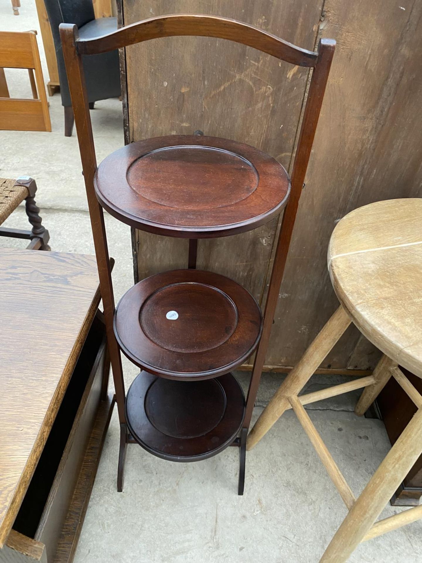 AN OAK LAMP TABLE/MAGAZINE RACK, AFTERNOON TEA STAND AND BEECH STOOL - Image 3 of 4