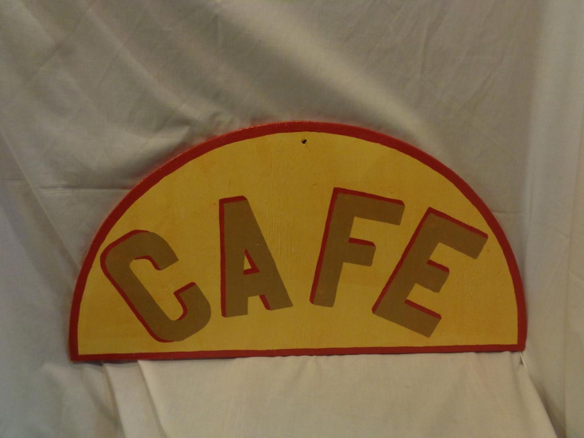 A SEMI CIRCULAR SIGN 'CAFE' DIAMETER 82CM X 42CM