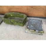 A SMALL STONE TROUGH AND A SUNDIAL TOP