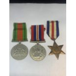 THREE MEDALS TO INCLUDE A DEFENCE MEDAL, THE FRANCE AND GERMANY STAR AND A 1939/1945 ALL WITH