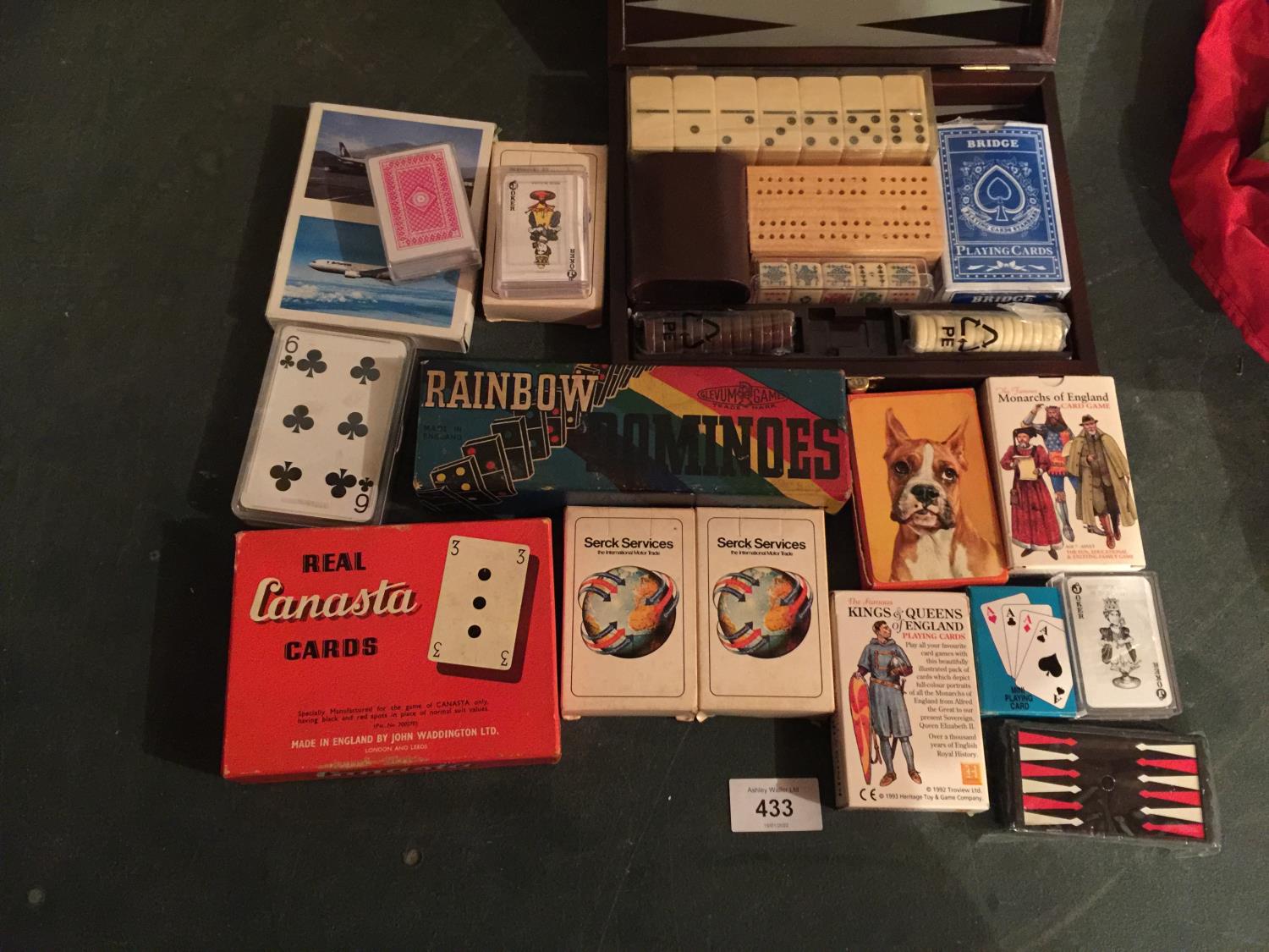 A QUANTITY OF PLAYING CARDS ALSO A BOXED GAMES SET, DOMINOES, ETC